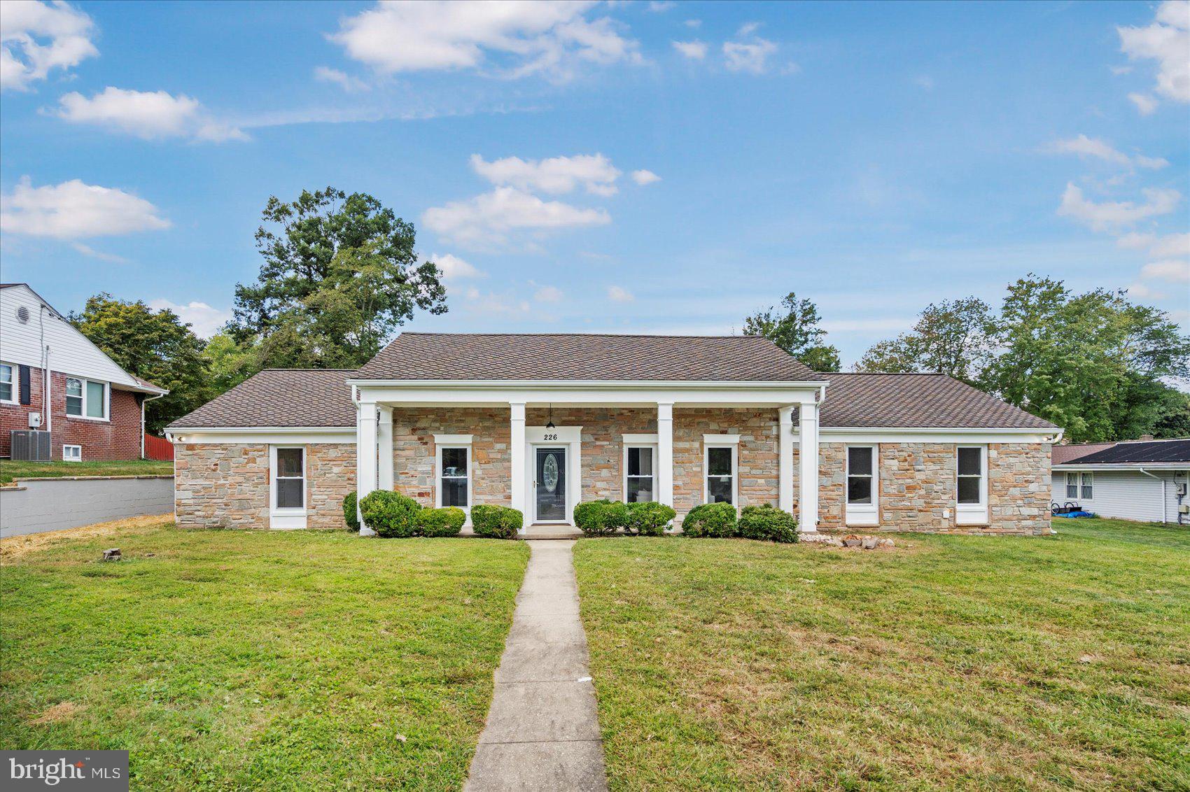 226 Mt Royal Avenue Aberdeen, MD 21001 - Photo 2 of 48 a front view of a house with a yard