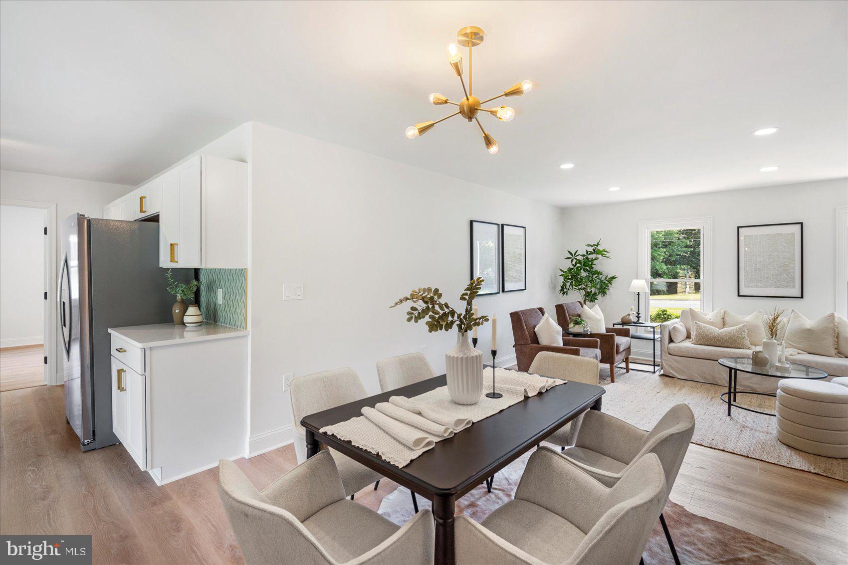 226 Mt Royal Avenue Aberdeen, MD 21001 - Photo 24 of 48 a living room with furniture kitchen view and a refrigerator