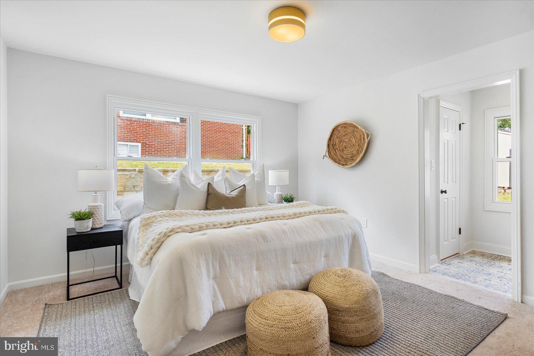 226 Mt Royal Avenue Aberdeen, MD 21001 - Photo 31 of 48 a bedroom with a bed and wooden floor