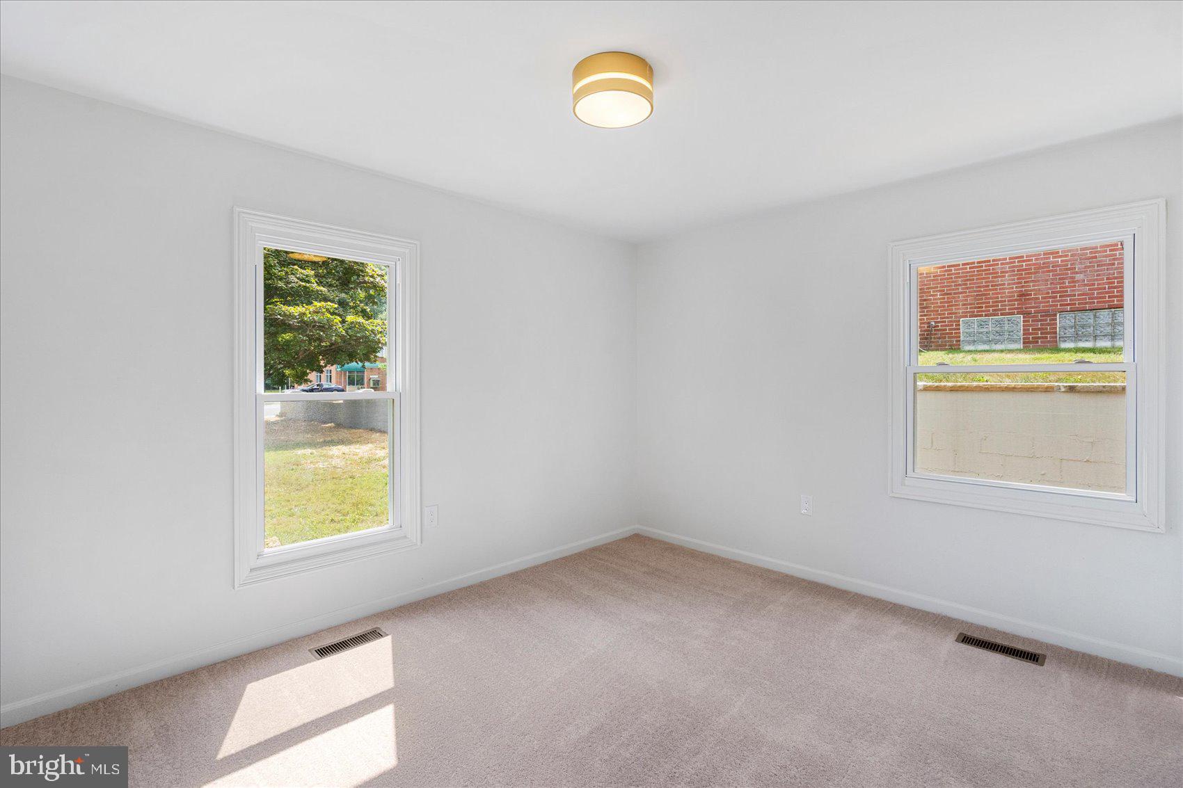 226 Mt Royal Avenue Aberdeen, MD 21001 - Photo 35 of 48 an empty room with a window