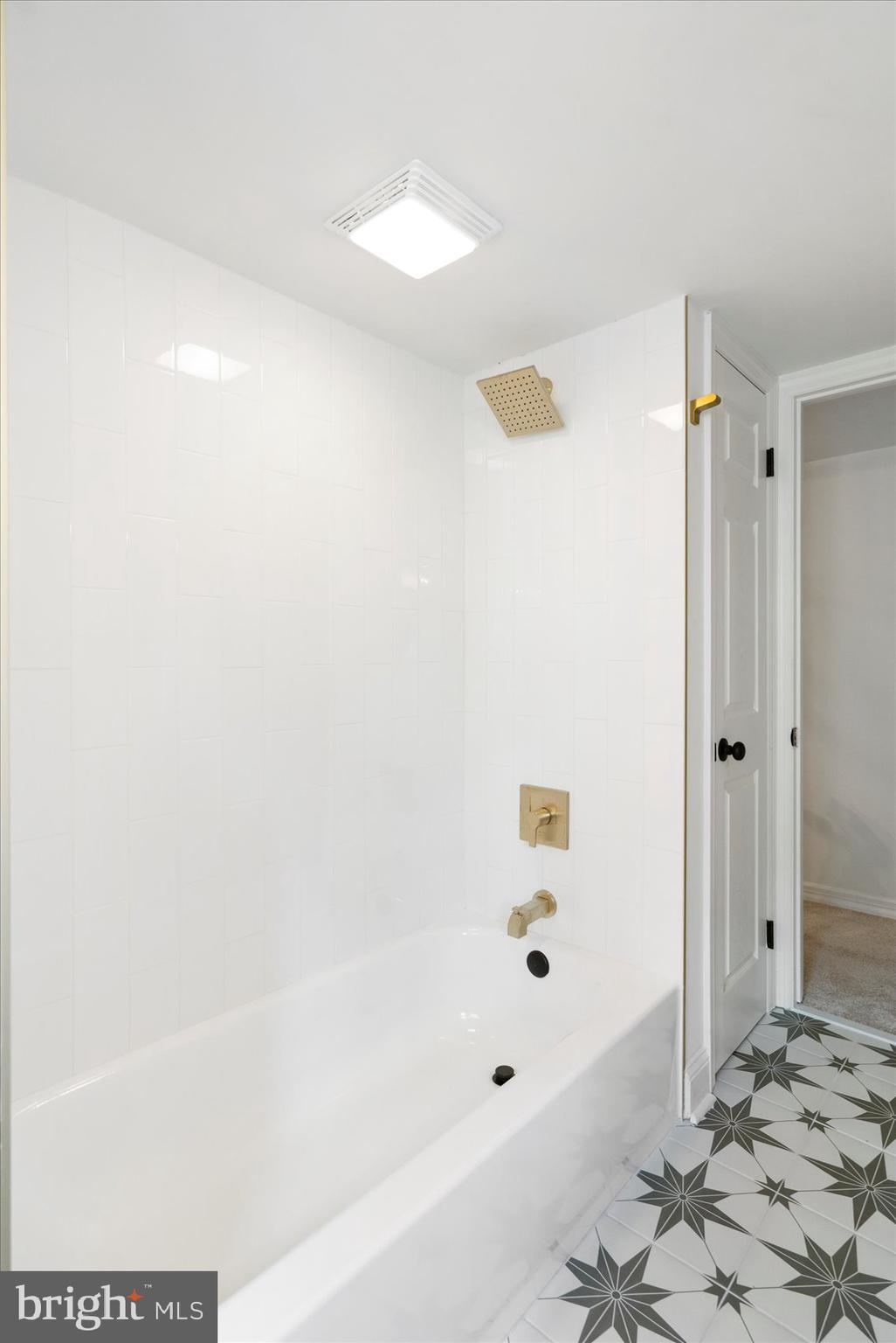 226 Mt Royal Avenue Aberdeen, MD 21001 - Photo 48 of 48 a bathroom with a bathtub and a shower