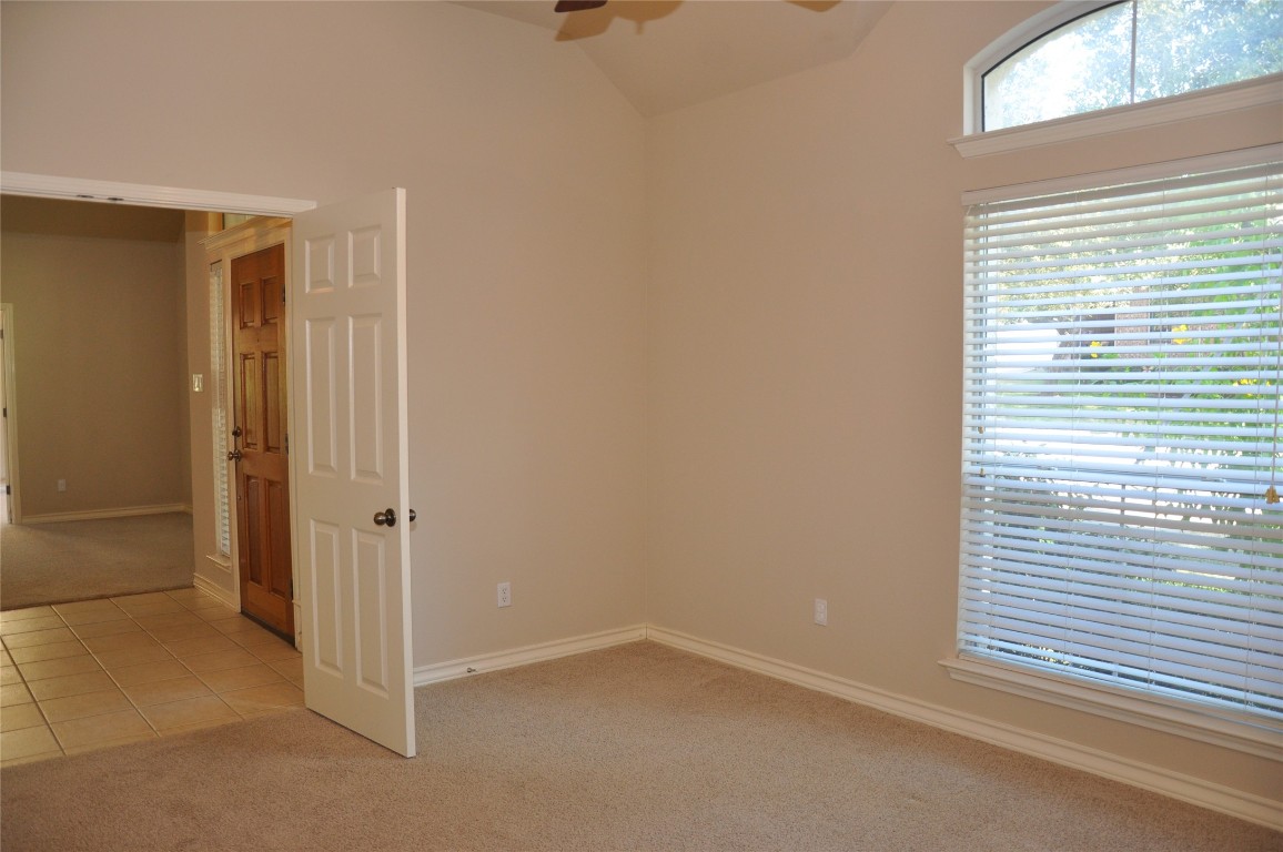 16616 Dalmahoy Drive Austin, TX 78717 - Photo 13 of 31 a view of an empty room with a window