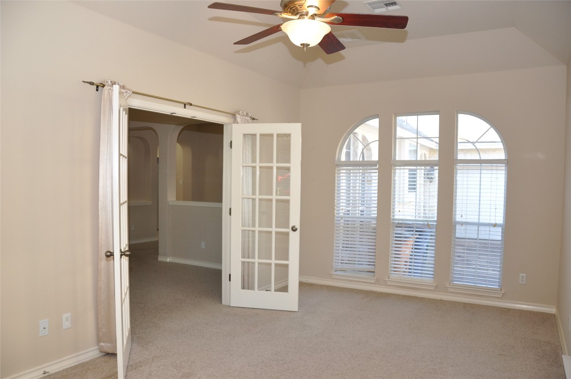16616 Dalmahoy Drive Austin, TX 78717 - Photo 15 of 31 a view of an empty room with a window