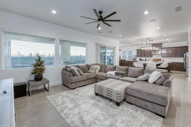 a kitchen with a table and chairs in it