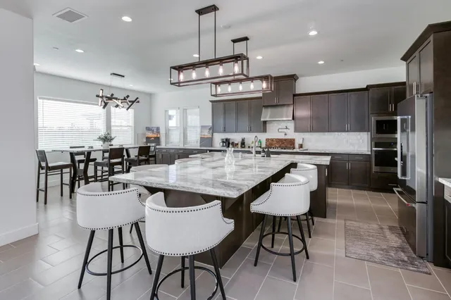 a view of a table and chairs in a room