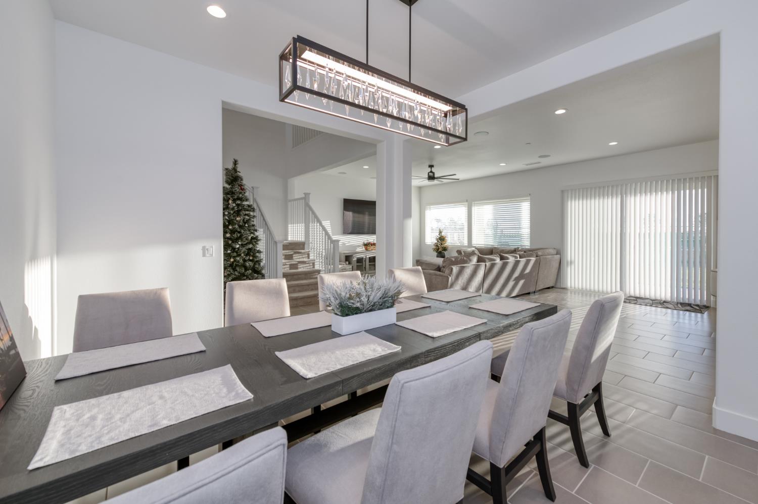 1042 Beaver Pond Loop Madera, CA 93636 - Photo 25 of 61 a view of a dining room with furniture