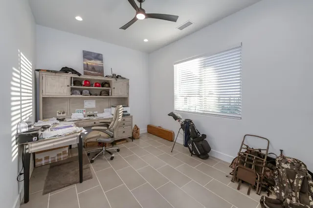 a bathroom with a bathtub and a toilet