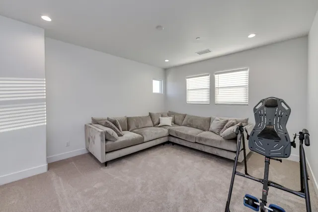 a bedroom with a bed and furniture