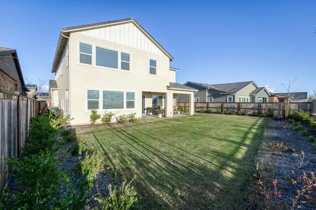 a view of a swimming pool with an outdoor space