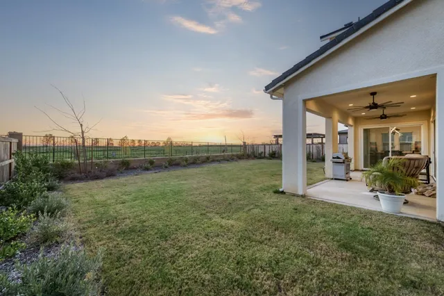a view of a balcony with an outdoor space and seating area