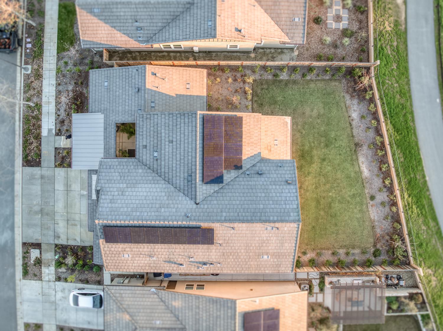1042 Beaver Pond Loop Madera, CA 93636 - Photo 54 of 61 an aerial view of residential houses with outdoor space