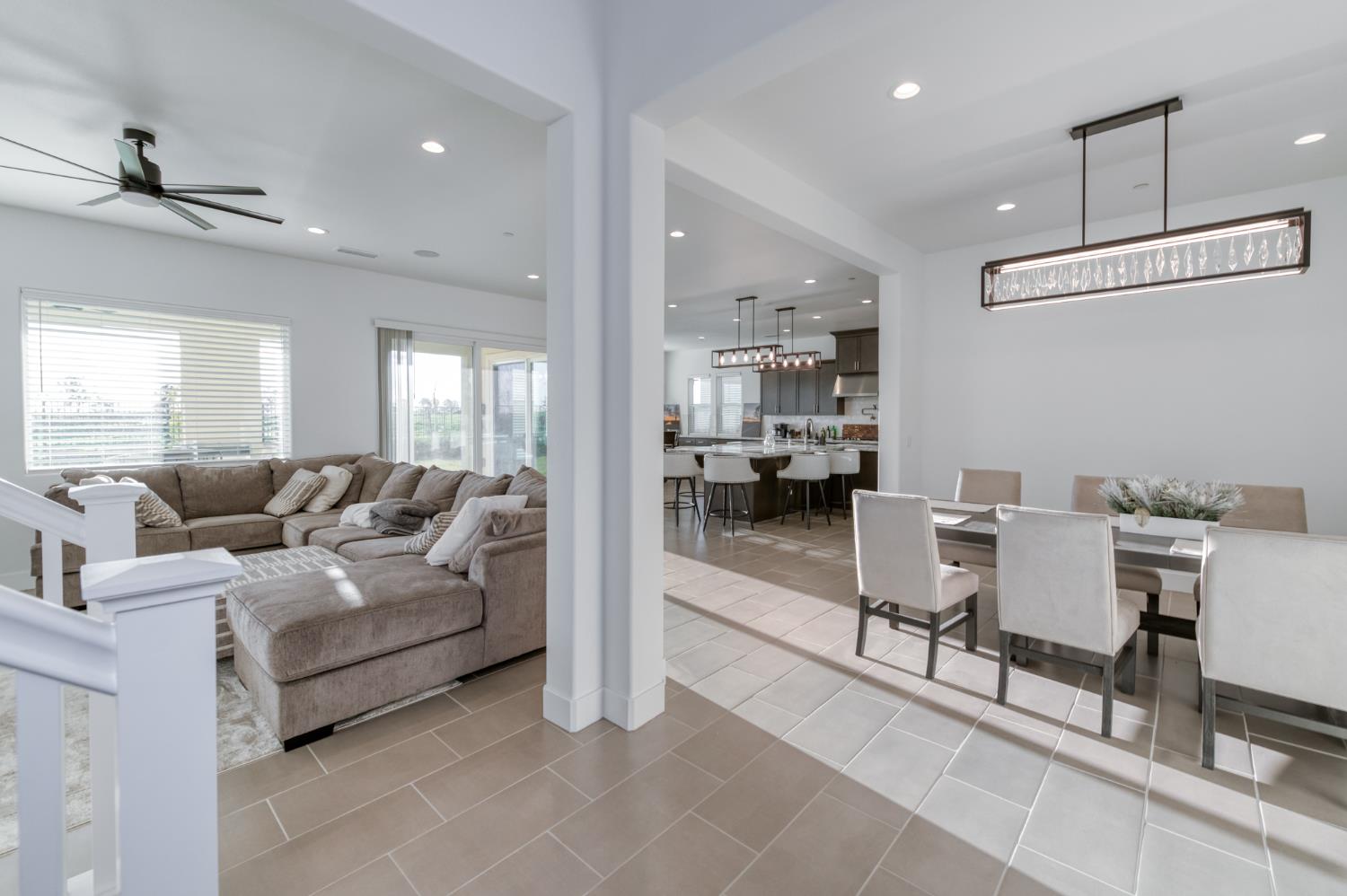 1042 Beaver Pond Loop Madera, CA 93636 - Photo 6 of 61 a living room with furniture and a table