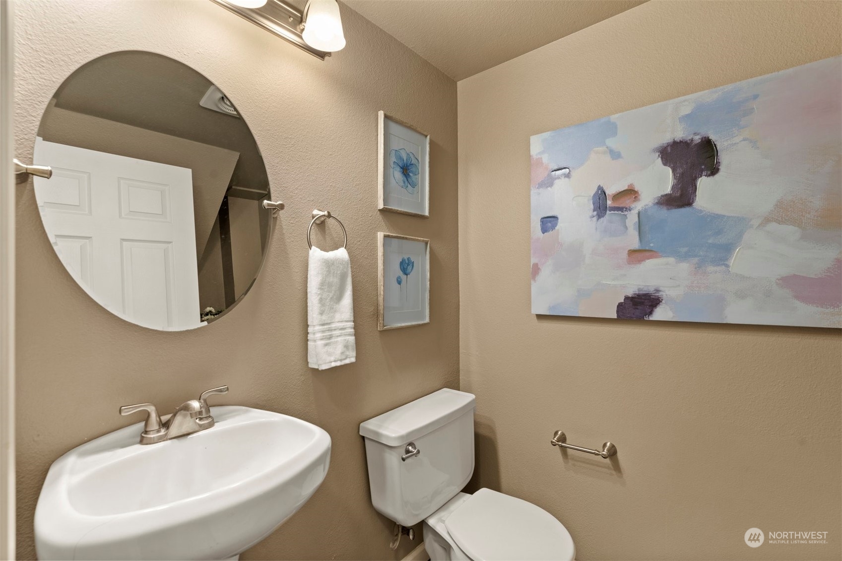 27403 Northeast 30th Way Redmond, WA 98053 - Photo 13 of 34 a bathroom with a toilet sink and mirror