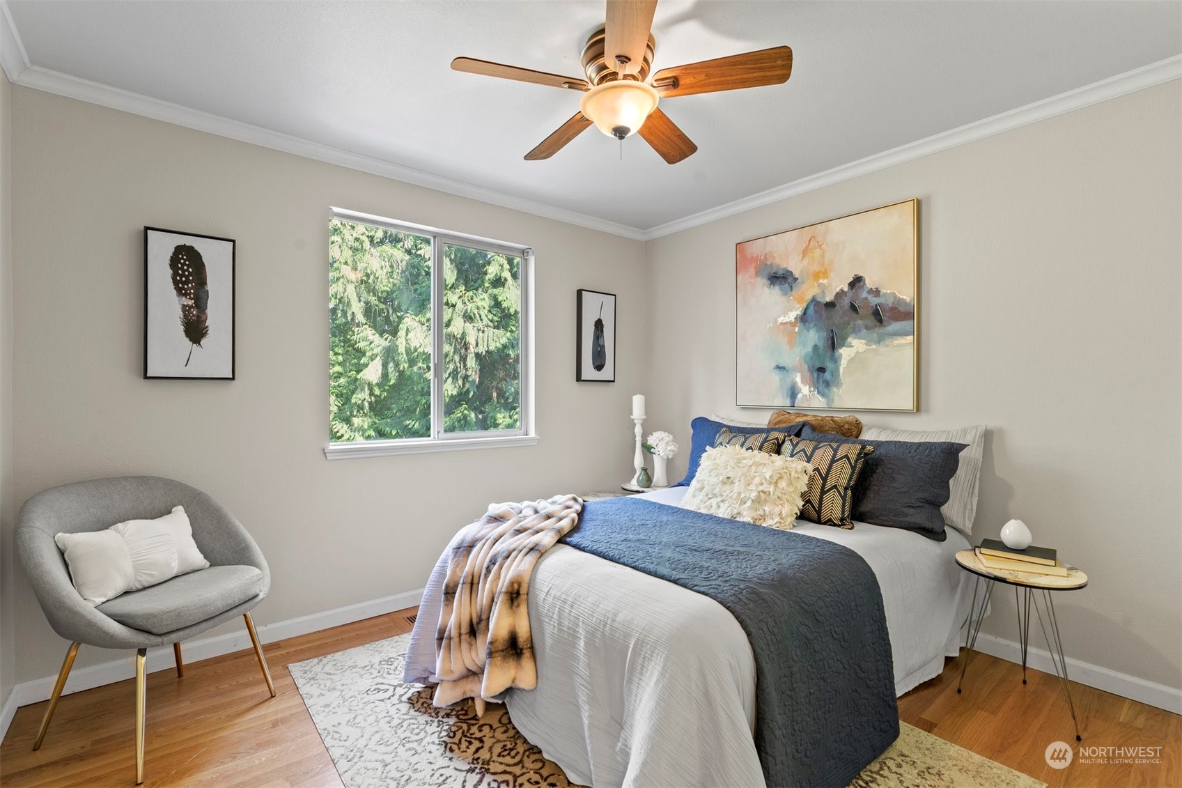 27403 Northeast 30th Way Redmond, WA 98053 - Photo 21 of 34 a bedroom with a bed and chair