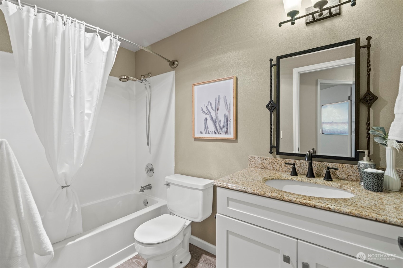 27403 Northeast 30th Way Redmond, WA 98053 - Photo 22 of 34 a bathroom with a granite countertop sink toilet and shower