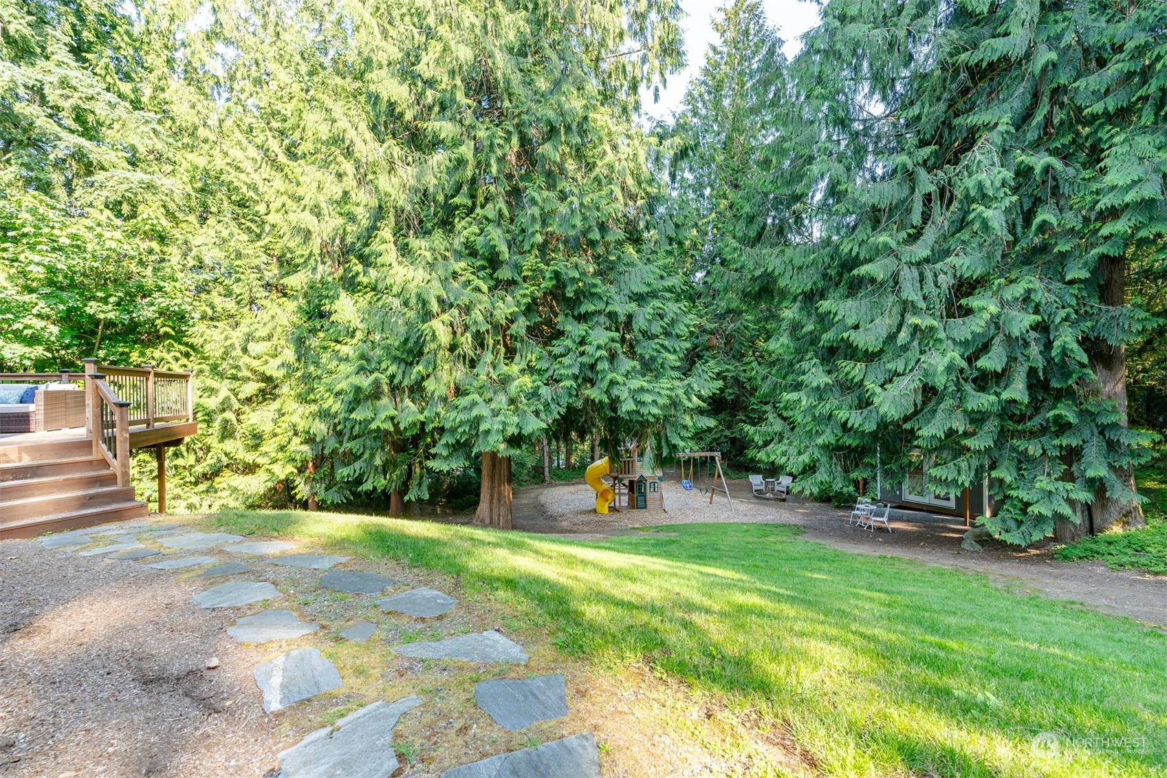 27403 Northeast 30th Way Redmond, WA 98053 - Photo 29 of 34 a view of green field with trees in the background