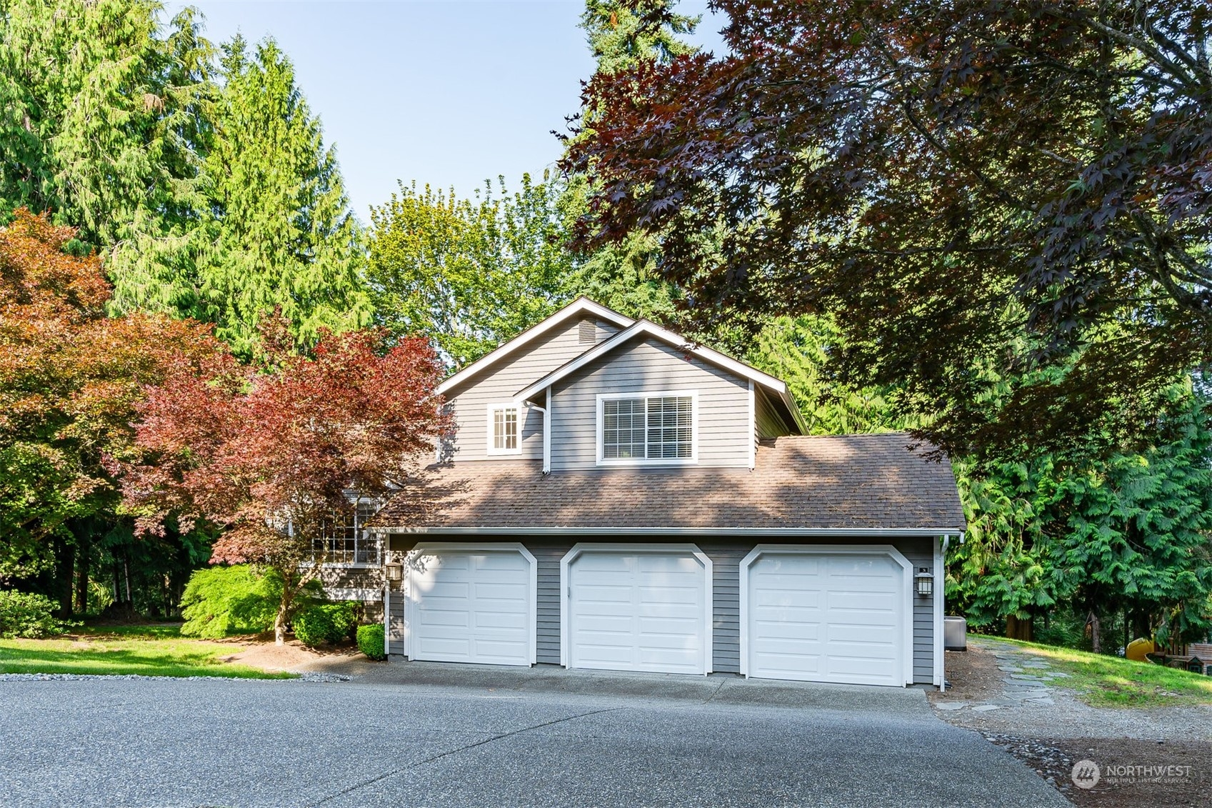 27403 Northeast 30th Way Redmond, WA 98053 - Photo 30 of 34 a view of house and outdoor space with yard