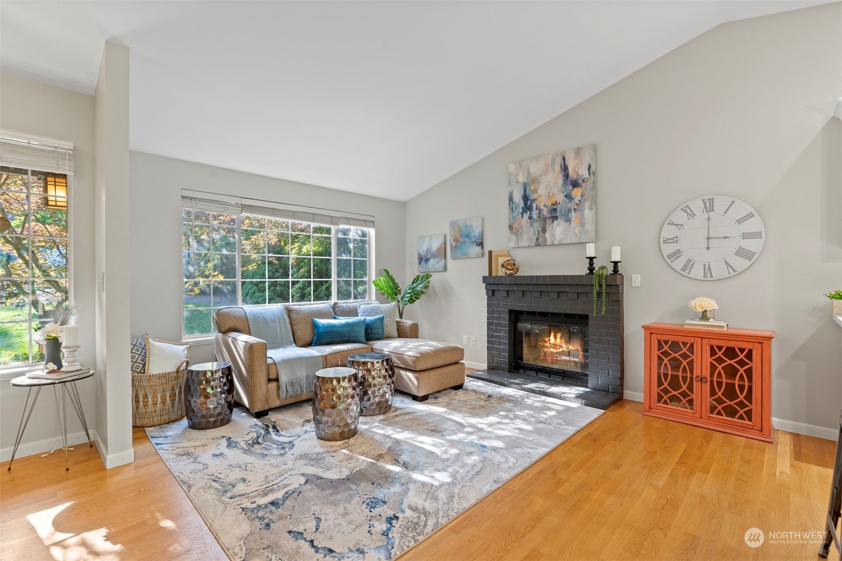 27403 Northeast 30th Way Redmond, WA 98053 - Photo 7 of 34 a living room with furniture and a fireplace