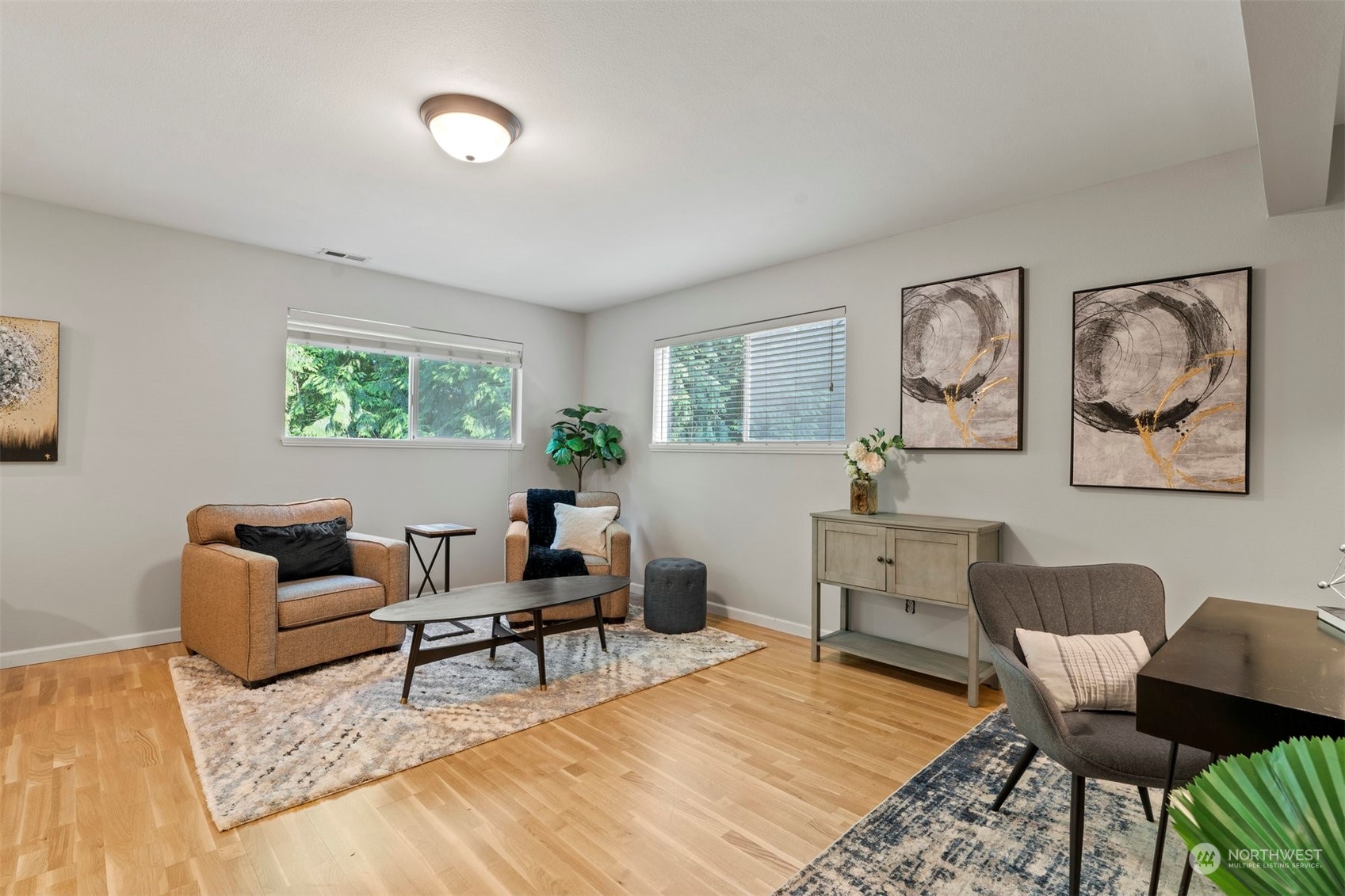 27403 Northeast 30th Way Redmond, WA 98053 - Photo 10 of 34 a living room with furniture and a wooden floor