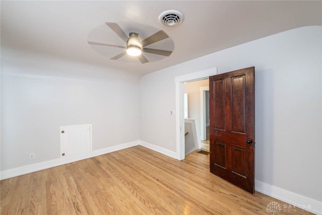 190 Swailes Road Troy, OH 45373 - Photo 43 of 82 This bright room features durable hardwood flooring and a functional ceiling fan for comfort.