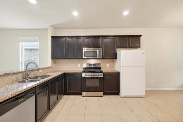 $2,065 | 12027 Rockridge Falls Drive, Tomball, TX 77375