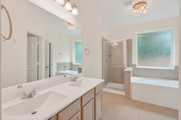 $2,065 | 12027 Rockridge Falls Drive, Tomball, TX 77375