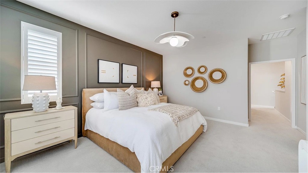 2581 Cloudview Privado Ontario, CA 91761 - Photo 12 of 19 a bedroom with a bed and a window