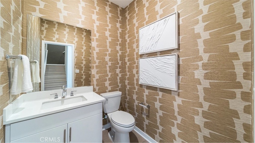 2581 Cloudview Privado Ontario, CA 91761 - Photo 7 of 19 a bathroom with a sink toilet and shower