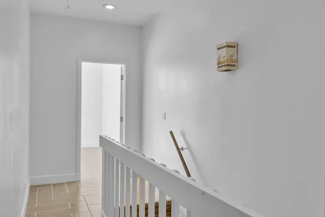 a view of a hallway with workspace