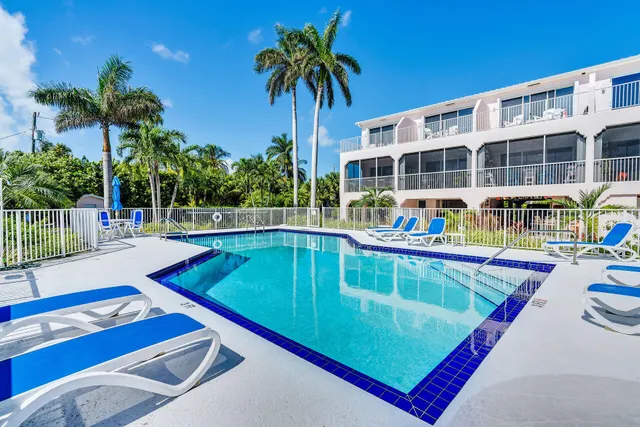 front view of a house with a swimming pool