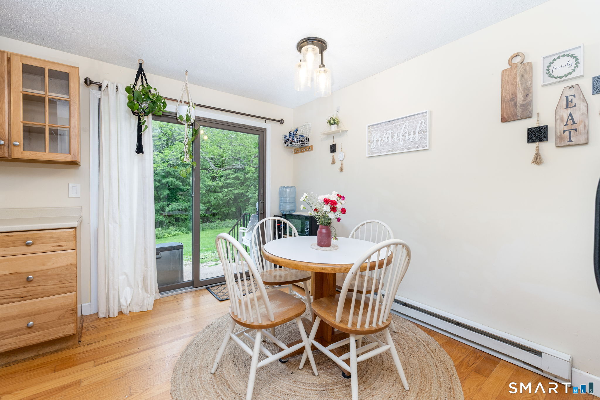 80 Wellswood Road, Unit 15 Hebron, CT 06231 - Photo 7 of 25 Slider to back patio