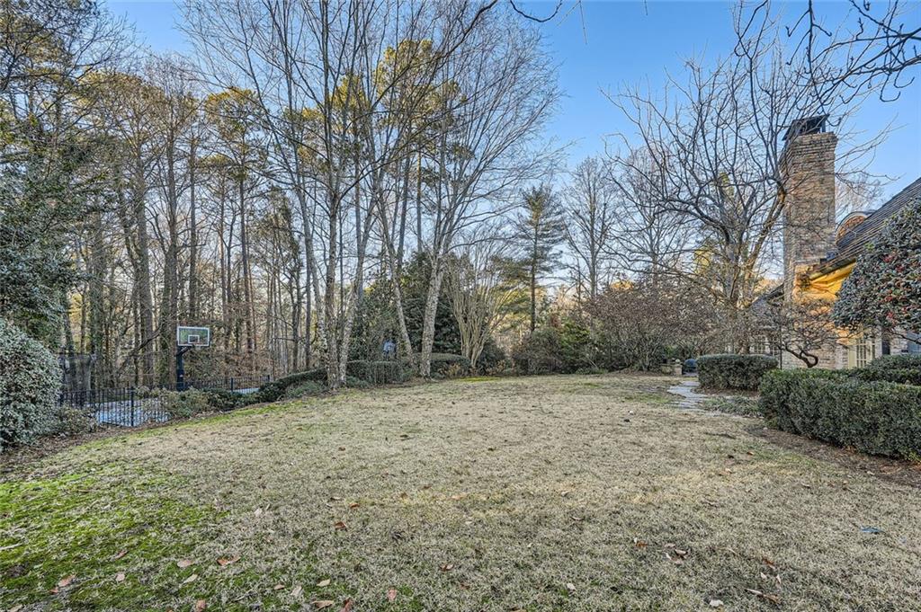 4340 Garmon Road Northwest Atlanta, GA 30327 - Photo 32 of 36 a view of a yard with trees