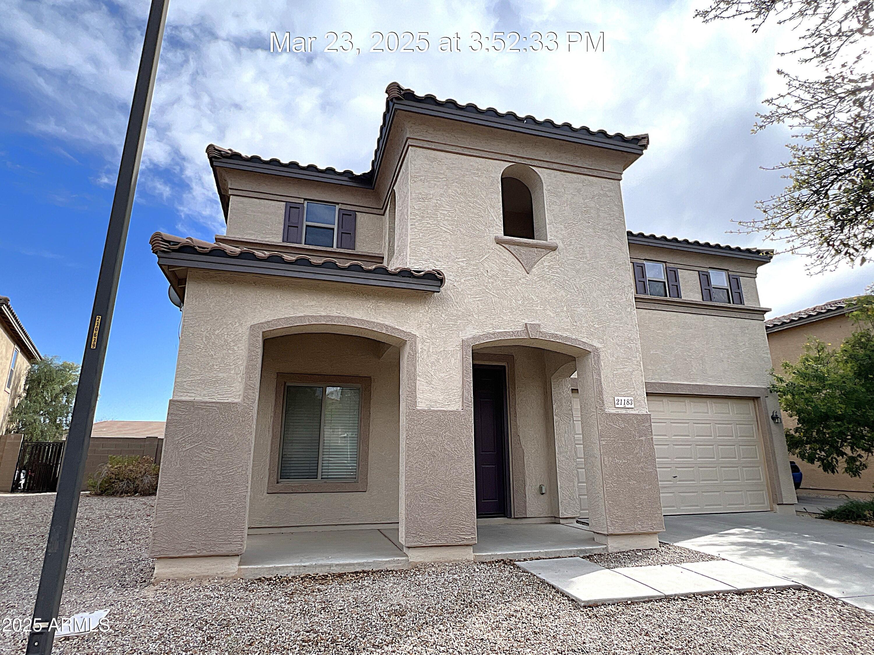 21183 East Avenida Del Valle Queen Creek, AZ 85142 - Photo 2 of 29 a front view of a house
