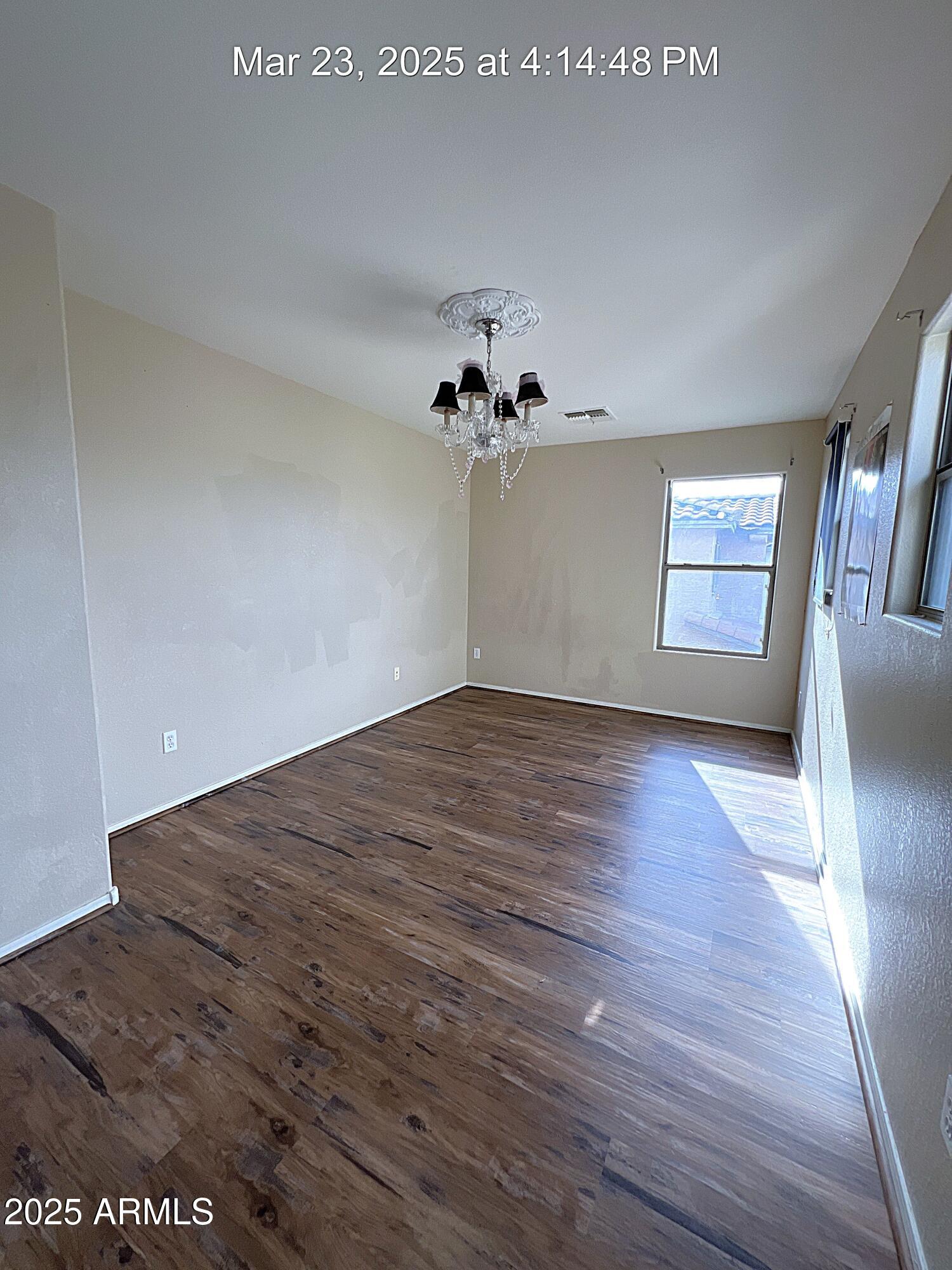 21183 East Avenida Del Valle Queen Creek, AZ 85142 - Photo 25 of 29 a view of a room with wooden floor and potted plants