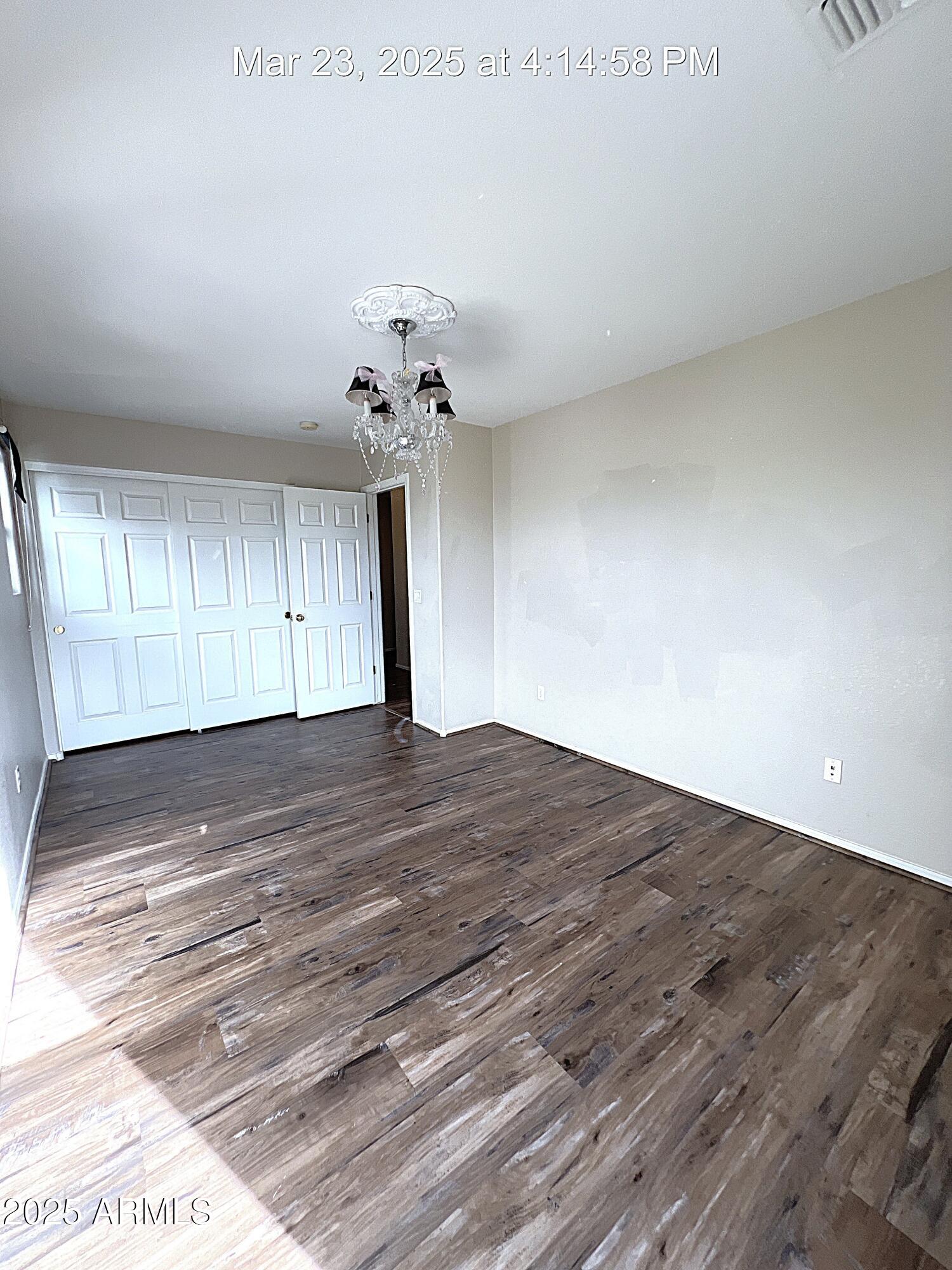 21183 East Avenida Del Valle Queen Creek, AZ 85142 - Photo 26 of 29 a view of empty room with wooden floor