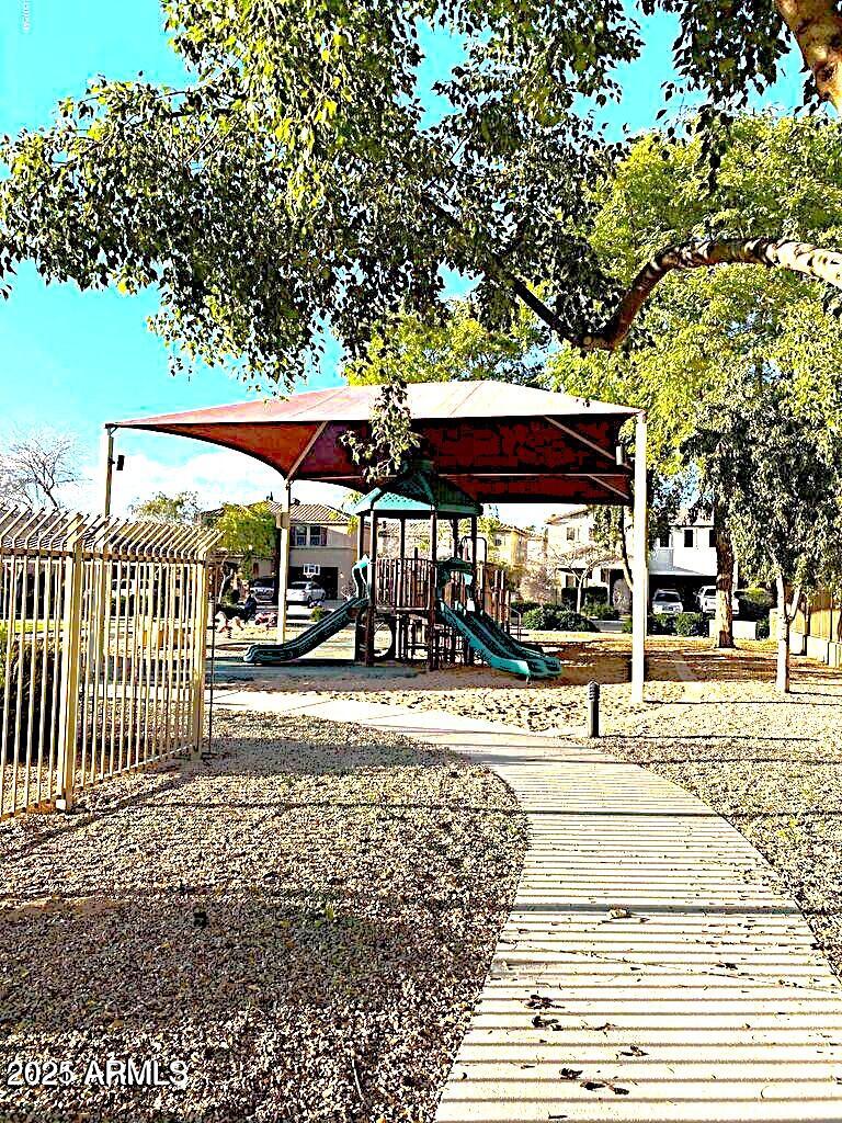 21183 East Avenida Del Valle Queen Creek, AZ 85142 - Photo 5 of 29 a view of a park with iron fence