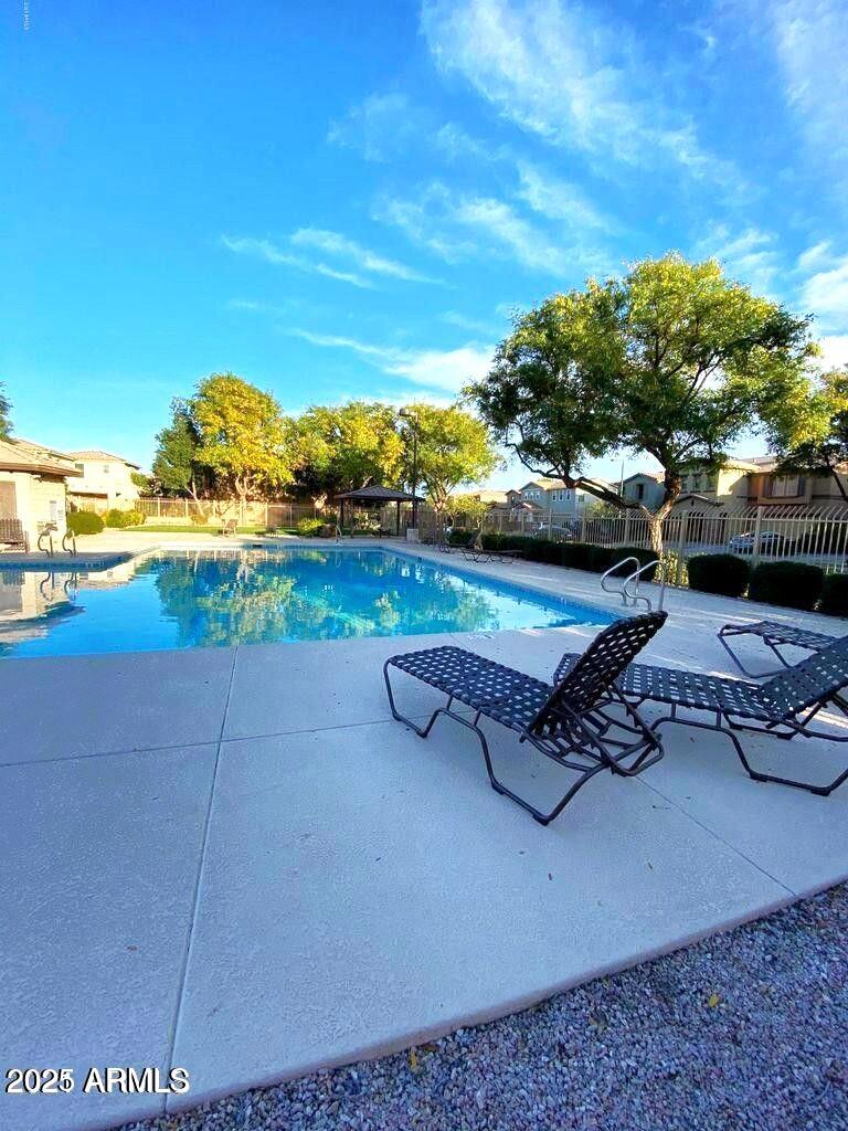 21183 East Avenida Del Valle Queen Creek, AZ 85142 - Photo 7 of 29 a view of a lake with outdoor space