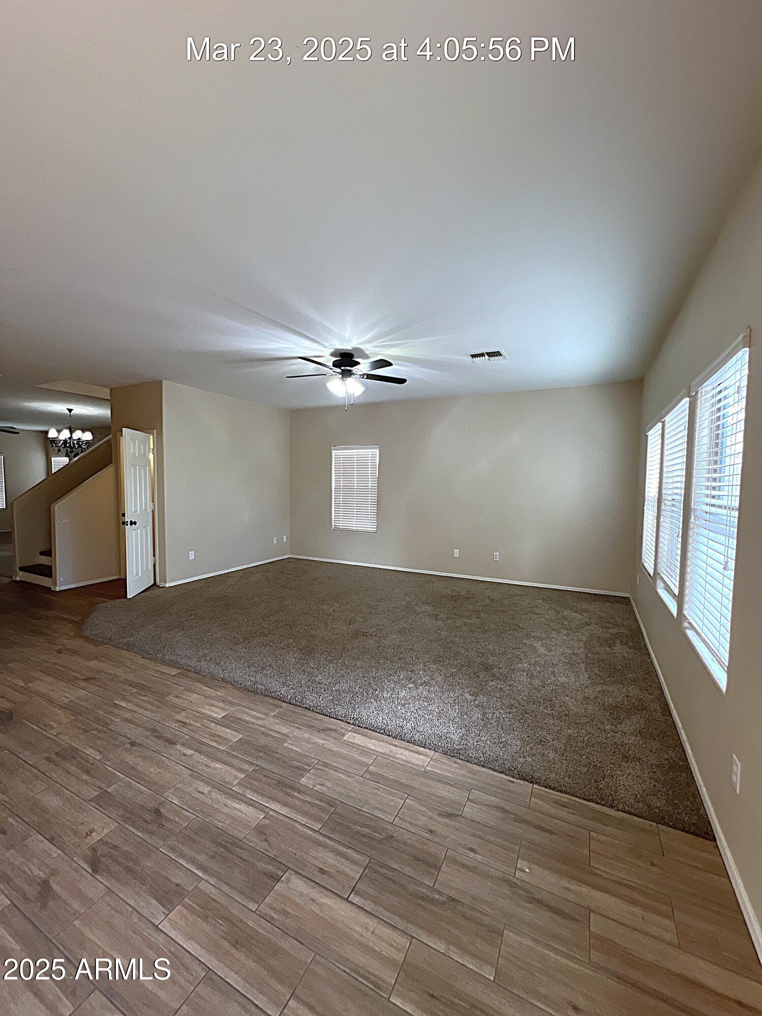 21183 East Avenida Del Valle Queen Creek, AZ 85142 - Photo 10 of 29 an empty room with wooden floor