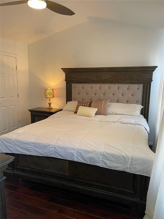 89 Regency Road Alpharetta, GA 30022 - Photo 14 of 17 a bedroom with a bed and a night stand