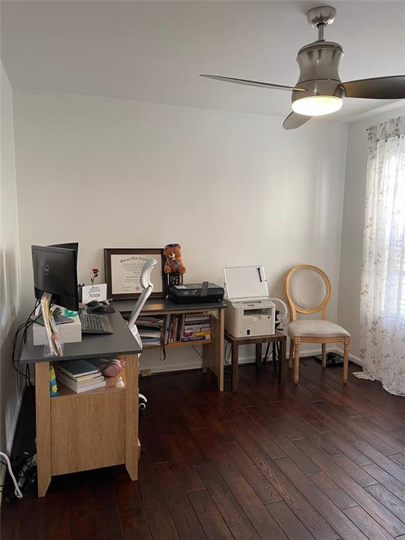 89 Regency Road Alpharetta, GA 30022 - Photo 8 of 17 a living room with furniture and a wooden floor