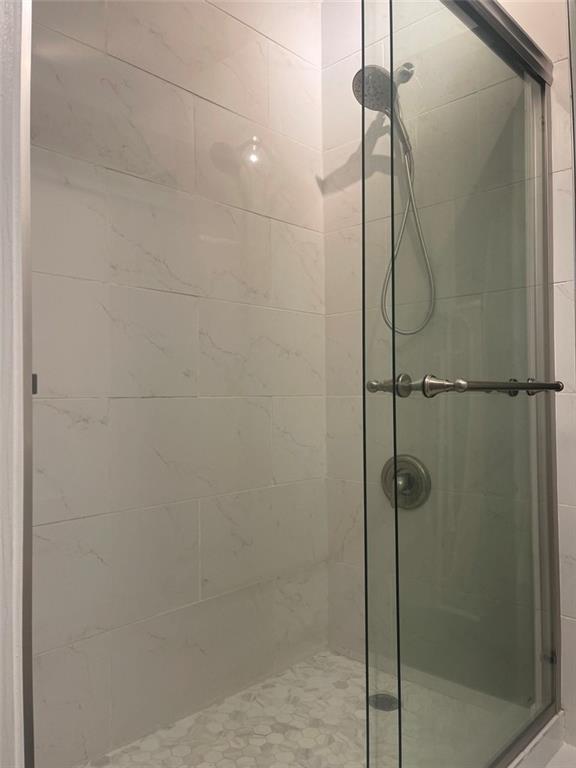 89 Regency Road Alpharetta, GA 30022 - Photo 9 of 17 a bathroom with a shower