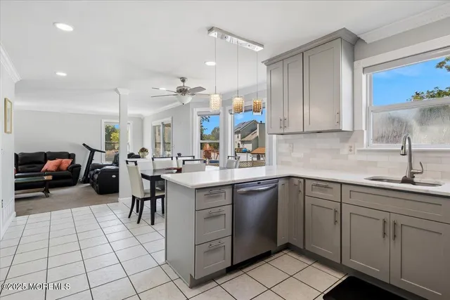 a kitchen with cabinets and sink
