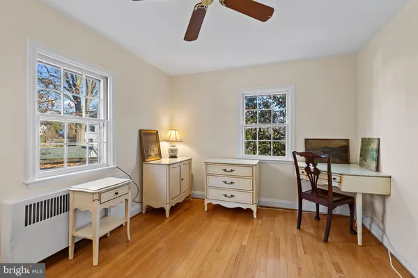 a room with furniture and a window