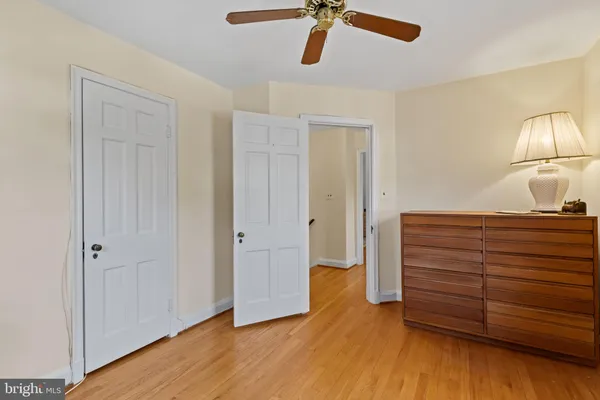 a view of room with wooden floor