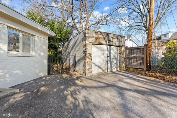a view of a house with a snow in the yard