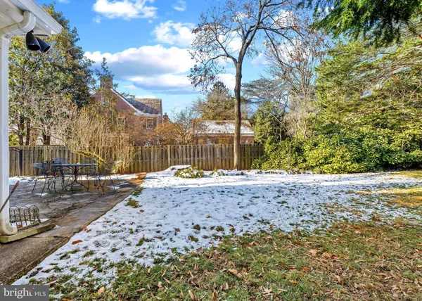a view of a backyard of the house