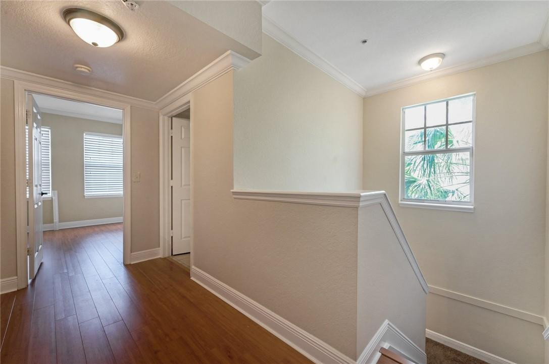 6348 West Sample Road, Unit 6348 Coral Springs, FL 33067 - Photo 18 of 25 Loft Area and entry to guest bedroom