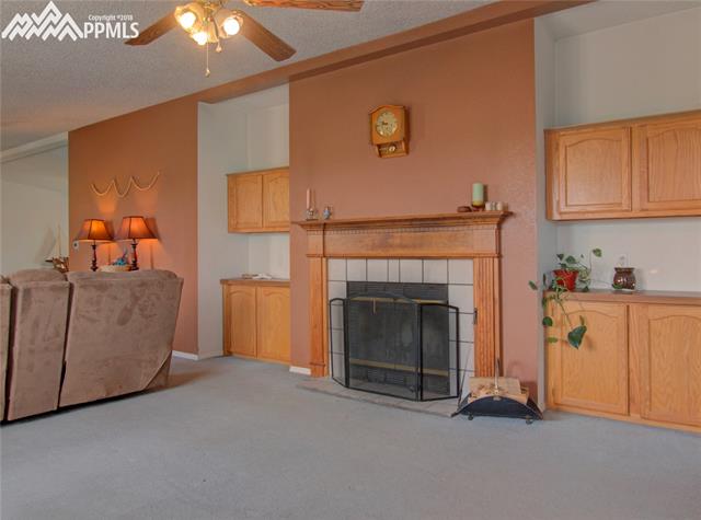 890 Ranchette Place Calhan, CO 80808 - Photo 6 of 26 Another view of the family room