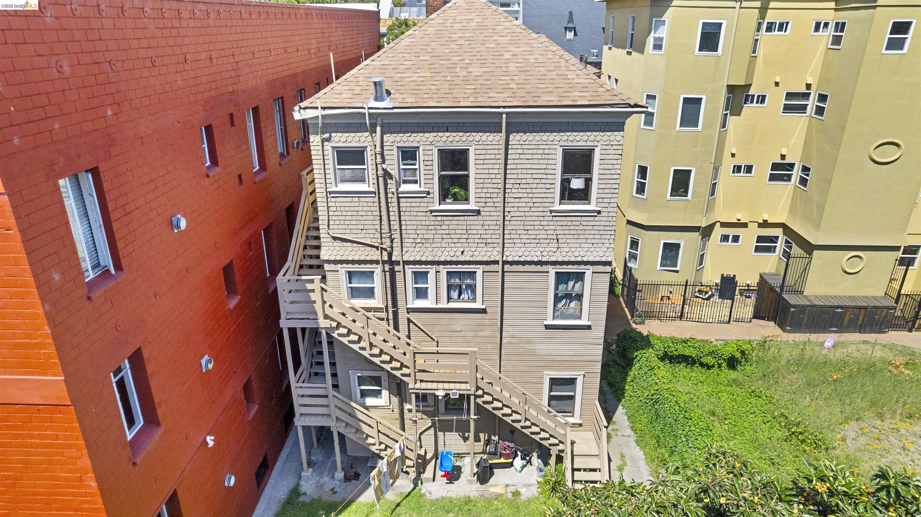 667 10th Street Oakland, CA 94607 - Photo 14 of 15 an aerial view of a house with a yard