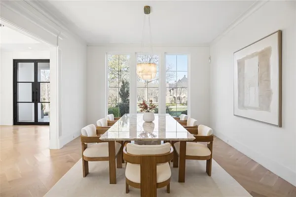a kitchen with stainless steel appliances granite countertop a stove a sink island and a refrigerator